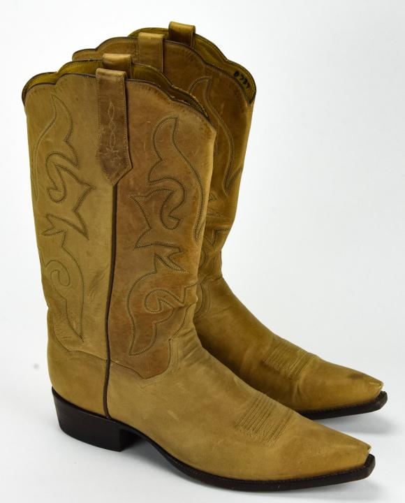 Men's Custom Leather Beige Cowboy Boots: Men's Custom Leather Beige Cowboy Boots. Custom made leather cowboy boots in Beige. Men's equivalent size 11/12. Leather shoe portion of boot measures 13 inches long x 4 inches across.