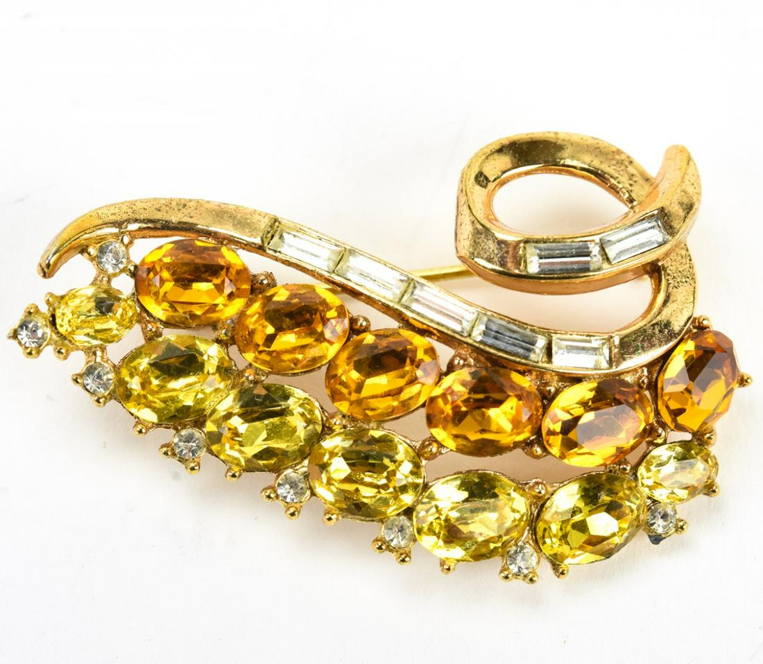 Vintage Trifari Rhinestone & Faux Citrine Gilt Pin: Vintage Trifari Rhinestone & Faux Citrine Gilt Brooch. Signed back. Measures 2 inches in length.