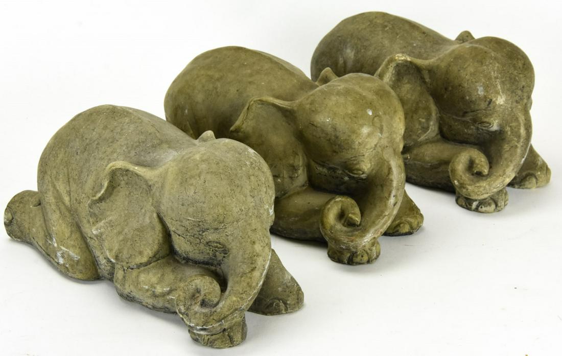 Trio Cast Stone Reclining Elephant Statues: Trio Cast Stone Reclining Elephant Statues. 5 inches x 9 inches x 5 inches