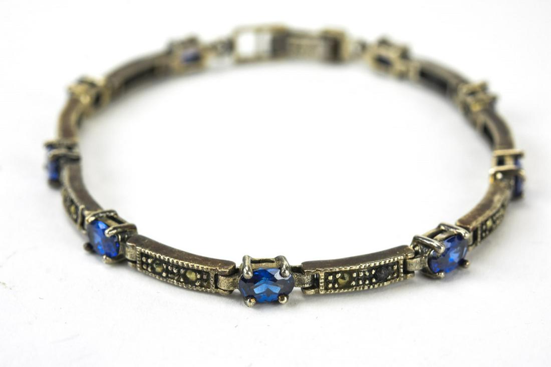Vintage Sterling Amethyst & Marcasite Bracelet: Vintage Sterling Amethyst & Marcasite Bracelet. Hallmarked. Measures 7.75 inches in length.