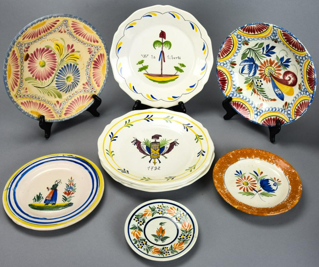 Collection of Quimper French Pottery Dishes: Collection of Quimper French Pottery Dishes. Includes pieces signed Quimper and French pottery hand painted dishes of varying sizes. Larger measures 9 1/8 inches in diameter.