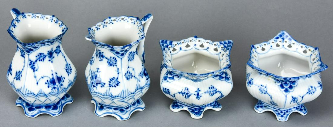 Four Royal Copenhagen Blue Onion Sugar & Creamers: Four Royal Copenhagen Blue Onion Sugar & Creamers. Marked on bottoms. Creamers measure 3.5 inches in height.