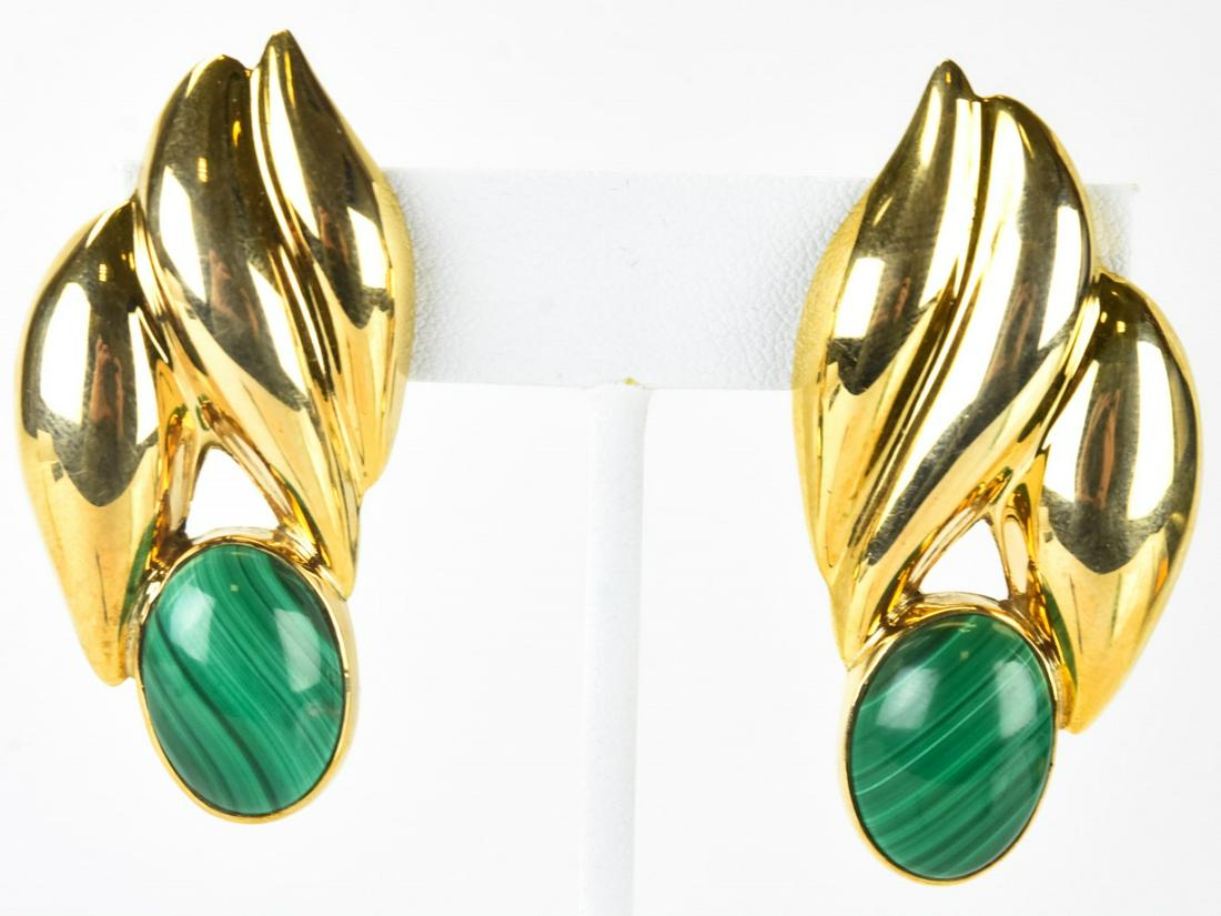 Pair Circa 1960 Gilt Sterling & Malachite Earrings: Pair Circa 1960 Gilt Sterling & Malachite Earrings. Gilt wash puffy sterling and malachite cabochon clip earrings. Hallmarked. Each measures nearly 2.25 inches in length.