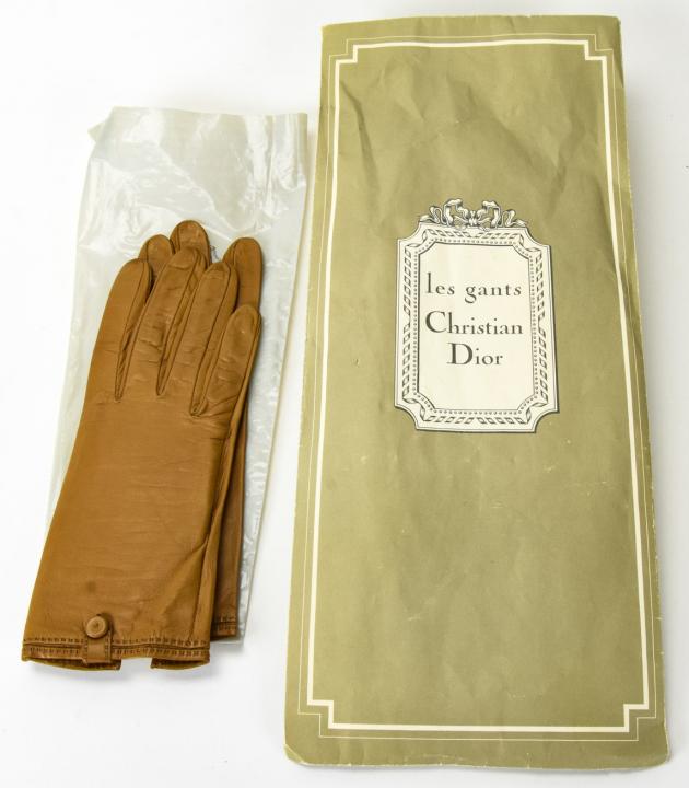 Pair 1950s Christian Dior French Leather Gloves: Pair 1950s Christian Dior French Leather Gloves. Brown leather gloves, size 6.5 with original envelope and glove inserts.