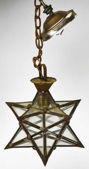 Welded Craftsman Style Hanging Star Lantern: Welded Craftsman Style Hanging Star Lantern. Pendent electric lantern with individual panes of glass welded into a star shape. 15 inches x 11 inches in diameter.
