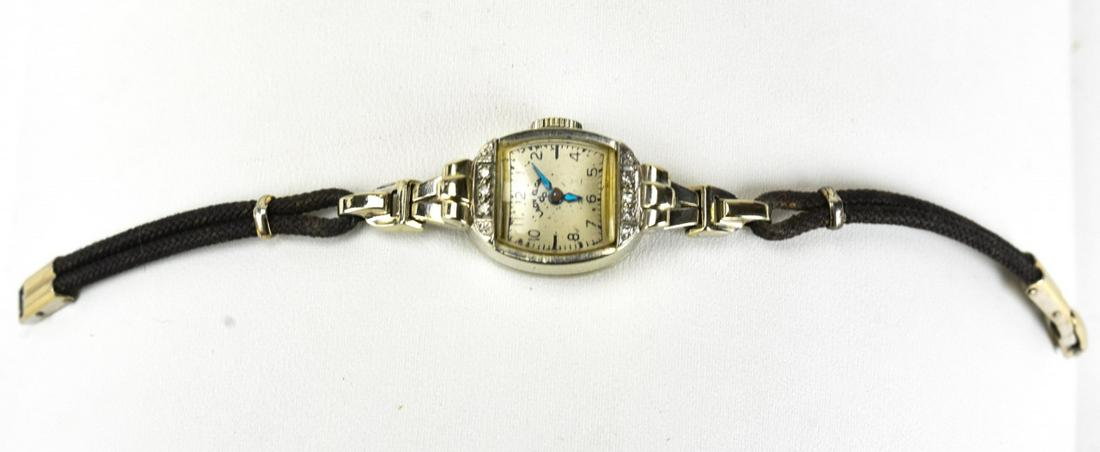 Antique Art Deco 14kt White Gold & Diamond Watch: Antique Art Deco 14kt White Gold & Diamond Watch. Made by Lady Elgin. Hallmarked 14kt on back. Measures 5.75 inches in overall length.