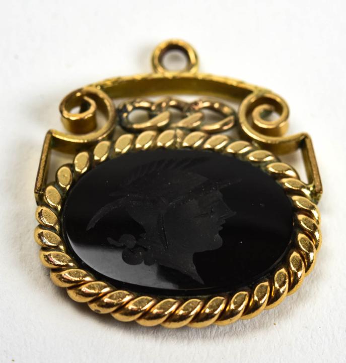Antique 19th C Onyx Intaglio Necklace Pendant: Antique 19th C Onyx Carved Intaglio Necklace Pendant / Charm / Fob. Having the triple link motif of the Odd Fellow's fraternal organization at the top. Measures 1 inch in length.