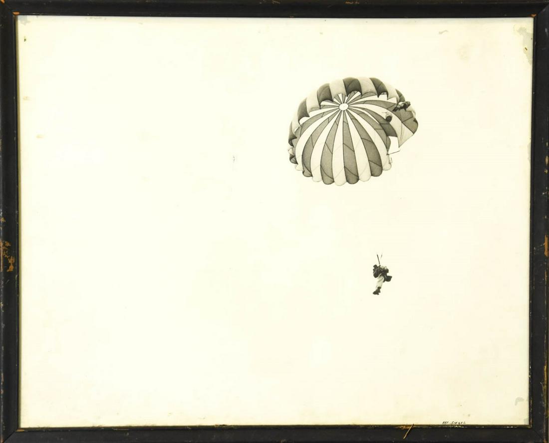 Art Siegel Black & White Photograph of Sky Diver: Art Siegel Black & White Photograph of Sky Diver. Framed photograph depicting a sky diver with an open parachute by Arthur S. Siegel. Signed Art Siegel in pen in the lower right. Frame measures 17.25