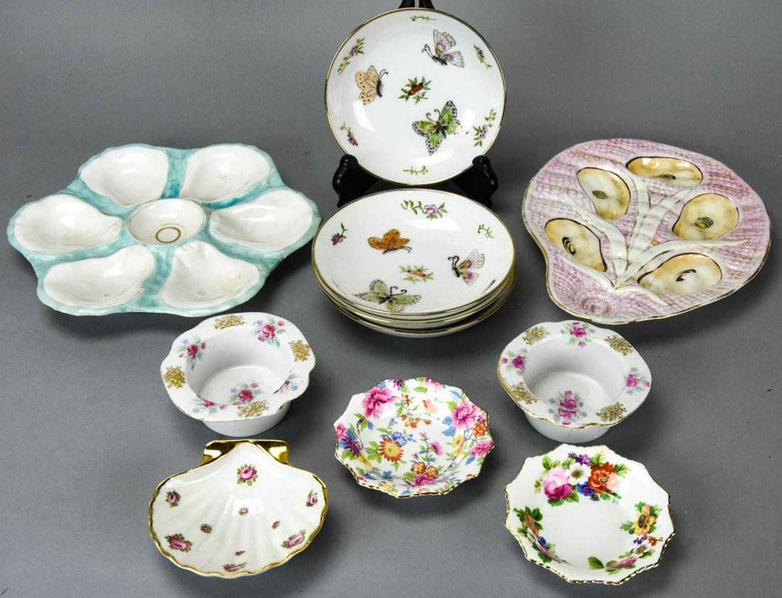 Lot Hand Painted Porcelain Serving Items W Limoges: Lot Hand Painted Porcelain Serving Items W Limoges. Includes two antique oyster plates, two soufle cups, three small Limoges dishes, and four hand painted butterfly dishes which each measure 5.5 inche