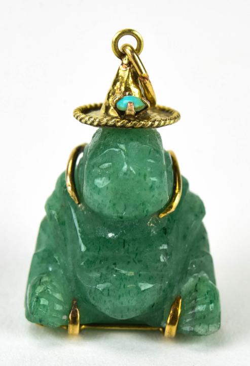 Estate 10kt Yellow Gold & Jade Buddha Pendant: Estate 10kt Yellow Gold & Jade Buddha Pendant or Charm. Tests as Jadeite on the Presidium. Measures 1.25 inches in length.