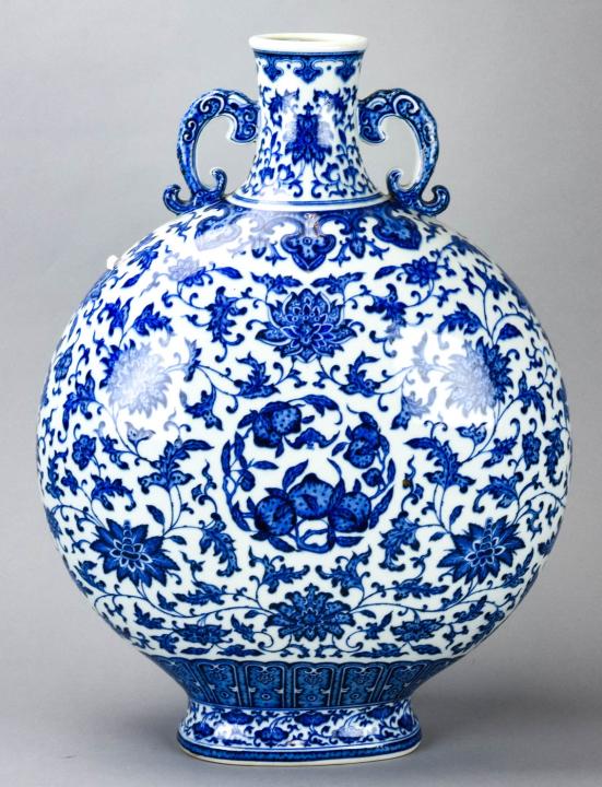 Chinese Blue & White Porcelain Moon Flask Vase: Chinese Blue & White Porcelain Moon Flask Vase. With handles, floral motif. Character mark on bottom. Measures 20 inches x 13.5 inches.