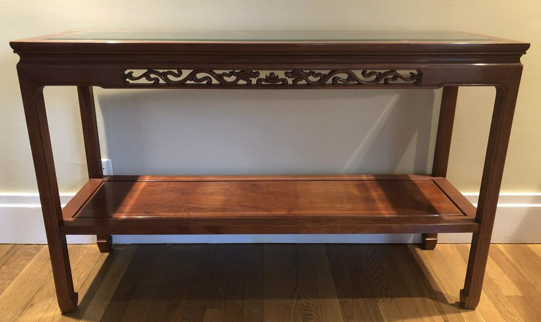 Asian Carved Rosewood Sofa Table Dragon Motif: Asian Carved Rosewood Glass Top Sofa Table wiht Dragon Motif. Carved rose wood console 2 levels for display with inlaid glass top. Apron has carved reticulated double dragon motif. 30 inches x 48 inch
