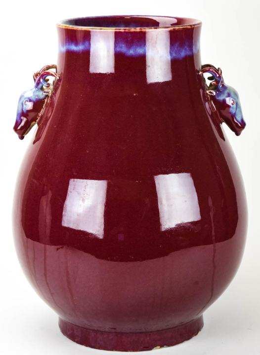 Large Chinese Flambe Glaze Ox Head Vessel: Large Chinese Flambe Glaze Ox Head Vessel. Large Chinese porcelain flambe glaze vessel with figural ox head handles. Measures approximately 20.5 inches x 12 inches.