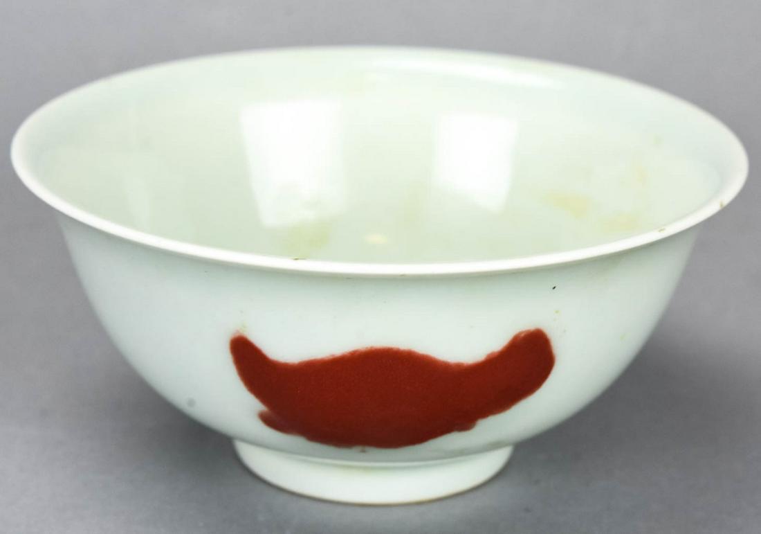 Chinese Ruby Glaze Fish Bowl Signed: Chinese Ruby Glaze Fish Bowl Signed. Chinese porcelain bowl with ruby glazed fish design. With six character mark on bottom. Measures 2.25 inches x 5 inches.