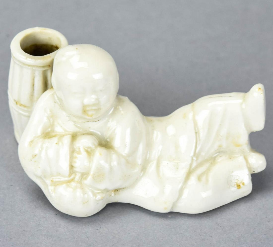 Chinese Blanc de Chine Miniature Incense Burner: Chinese Blanc de Chine Miniature Incense Burner. Figural reclining sage motif. Measures 1.5 inches x 2.5 inches x 1.5 inches.