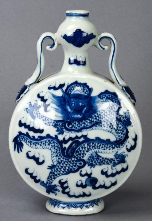 Chinese Blue & White Porcelain Moon Flask Signed: Chinese Blue & White Porcelain Moon Flask Signed. With phoenix motif, four character mark on bottom. Measures 7.5 inches x 4.5 inches x 2 inches.