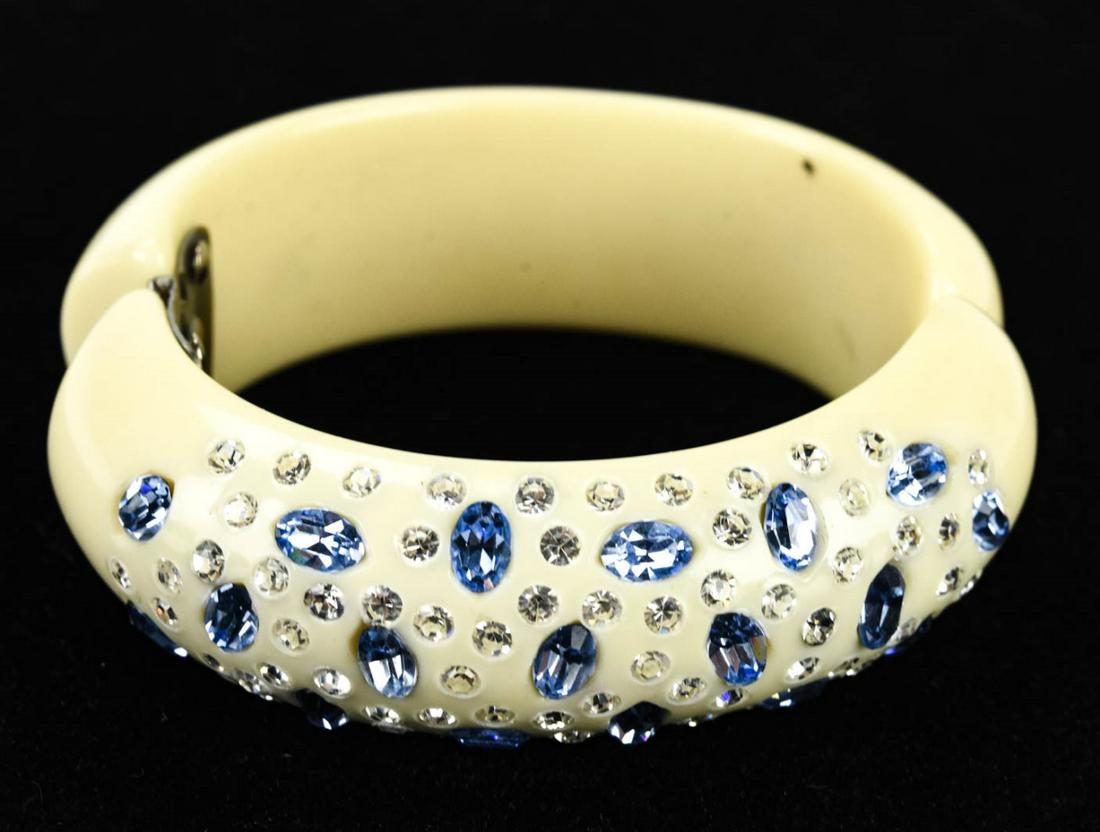 Vintage Bakelite & Rhinestone Clamper Bracelet: Vintage Bakelite & Rhinestone Clamper Bracelet. Measures 2.25 inches across the opening.