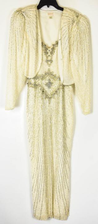Yolanda Designer's Collection Heavily Beaded Gown: Yolanda Designer's Collection Heavily Beaded Gown & Cape. Labeled for Yolanda Designer's Collection. Gown measures approximately 18.5 inches in width and 53 inches in total length.