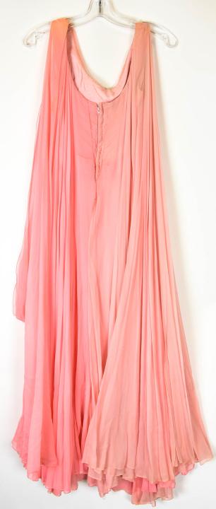 Vintage Designer Pink Organza Evening Gown / Dress: Vintage Designer Pink Organza Evening Gown / Dress. With attached flowing cape back. Measures approximately 15 inches across the shoulders, 53 inches overall length.
