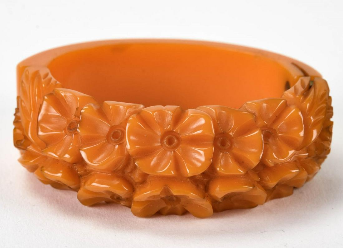 Vintage C 1940s Orange Bakelite Clamper Bracelet: Vintage C 1940s Orange Bakelite Clamper Bracelet. Measures just over 2.25 inches across interior opening.