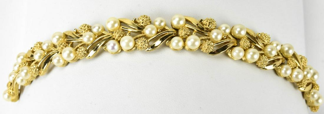 Vintage C 1960s Trifari Gilt & Faux Pearl Bracelet: Vintage C 1960s Trifari Gilt & Faux Pearl Bracelet. Measures 7 inches in length.