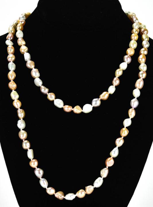 Hand Knotted Multi Color Baroque Pearl Necklace: Hand Knotted Multi Color Baroque Pearl Necklace. Tones of champagne, pink, grey and white. Measures 42 inches in length.