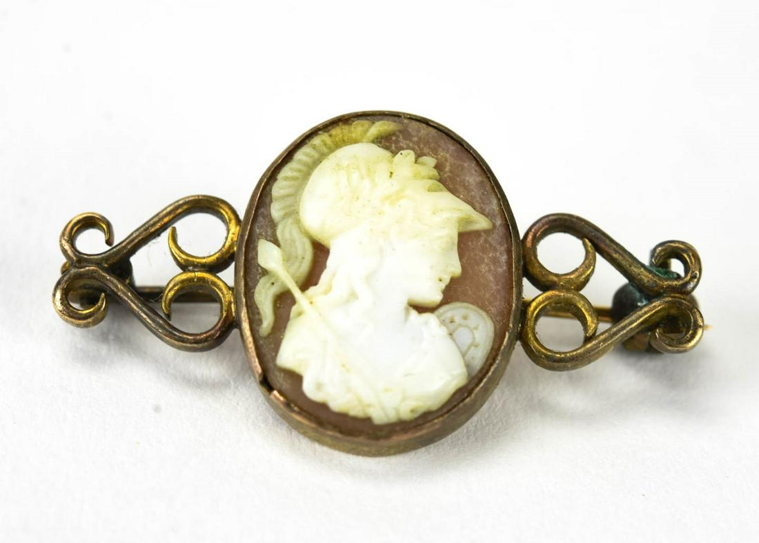 Antique 19th C Hand Carved Shell Cameo Brooch: Antique 19th C Hand Carved Shell Cameo Brooch. Measures 1.25 inches in width. Greco Roman soldier motif.