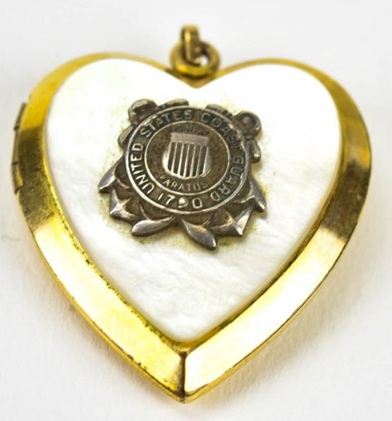 Vintage United States Coast Guard Locket Pendant: Vintage United States Coast Guard Locket Pendant. Gilt metal and mother of pearl. Measures 1.5 inches in length.