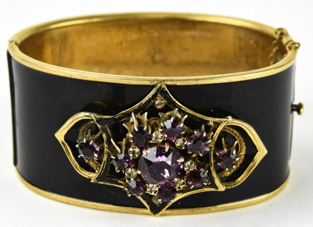 Vintage Elsa Schiaparelli Enamel & Paste Bracelet: Vintage Elsa Schiaparelli Enamel & Paste Bracelet. Circa 1930s. Hinged bangle bracelet. Signed. Black enamel / paint rhinestones and gilt metal. Measures 2.5 inches across interior opening.