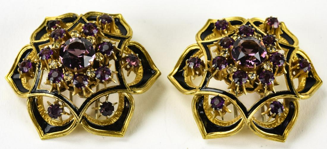 Pr Vintage Elsa Schiaparelli Enamel & Paste Clips: Pair of Vintage Elsa Schiaparelli Enamel & Paste Clips. Signed. Circa 1930s. Gilt metal, black enamel / paint and rhinestones. Each measures 1.5 inches in diameter.