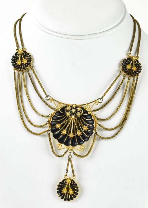 Vintage Elsa Schiaparelli Enamel & Paste Necklace: Vintage Elsa Schiaparelli Enamel & Paste Necklace. Circa 1930s. Signed on tag at clasp. Festoon design with black enamel / paint and faux pearls in shell design. Measures approximately 14 inches in le