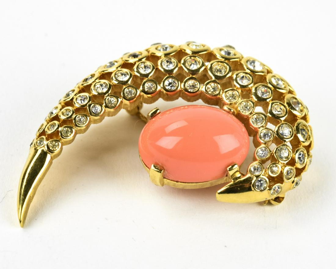C 1970 Jomaz Retro Rhinestone Faux Coral Brooch: C 1970 Jomaz Retro Rhinestone Faux Coral Brooch. Retro design gilt metal, rhinestone and faux coral cabochon brooch. Signed. Measures 2 inches in width.