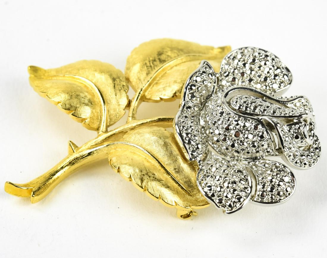 1970s Trifari Two Tone Rhinestone Rose Brooch: 1970s Trifari Two Tone Rhinestone Rose Brooch. Signed on back. Measures 2.5 inches.