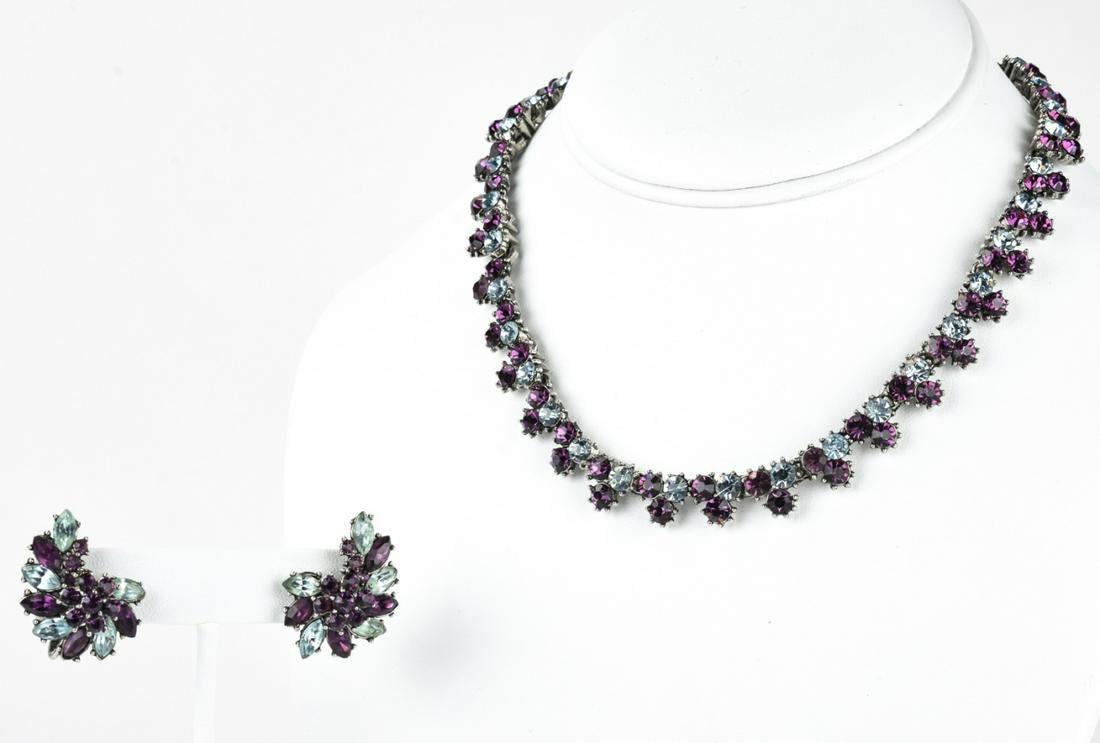 C 1975 Trifari Necklace & Earrings: C 1975 Trifari Necklace & Earrings. Two purple and blue toned rhinestones, earrings are clips. Necklace measures 15.5 inches.