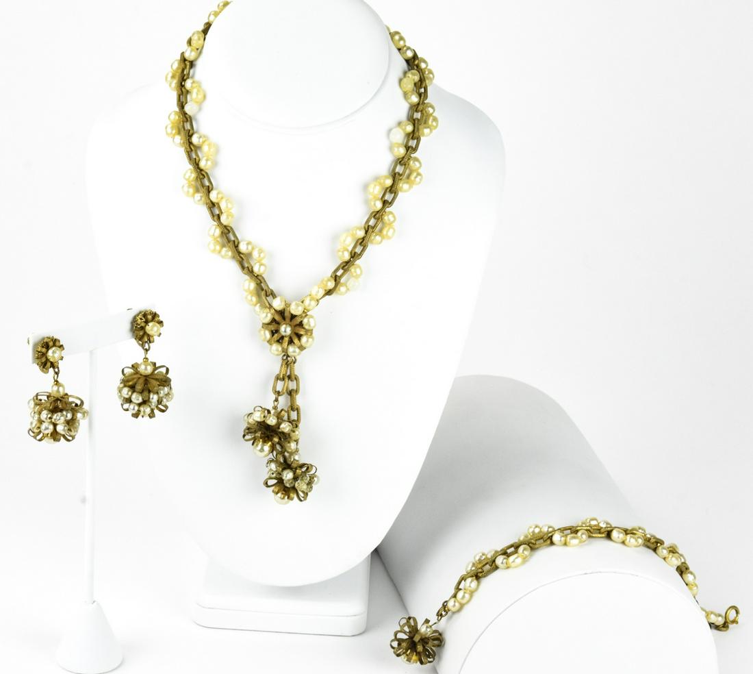 1960s Miriam Haskell Necklace Earring Bracelet Set: 1960s Miriam Haskell Necklace Earring Bracelet Set. Pearl and textured gilt metal design. Signed. Necklace measures 16 inches.