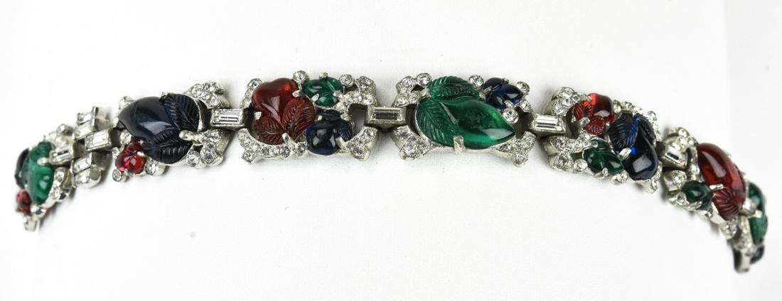 Antique C 1920s TKF Trifari Art Deco Bracelet: Antique C 1920s TKF Trifari Art Deco Bracelet. Fruit salad colored stones / clear rhinestones. Measures 7.25 inches in length, old price tag for $750