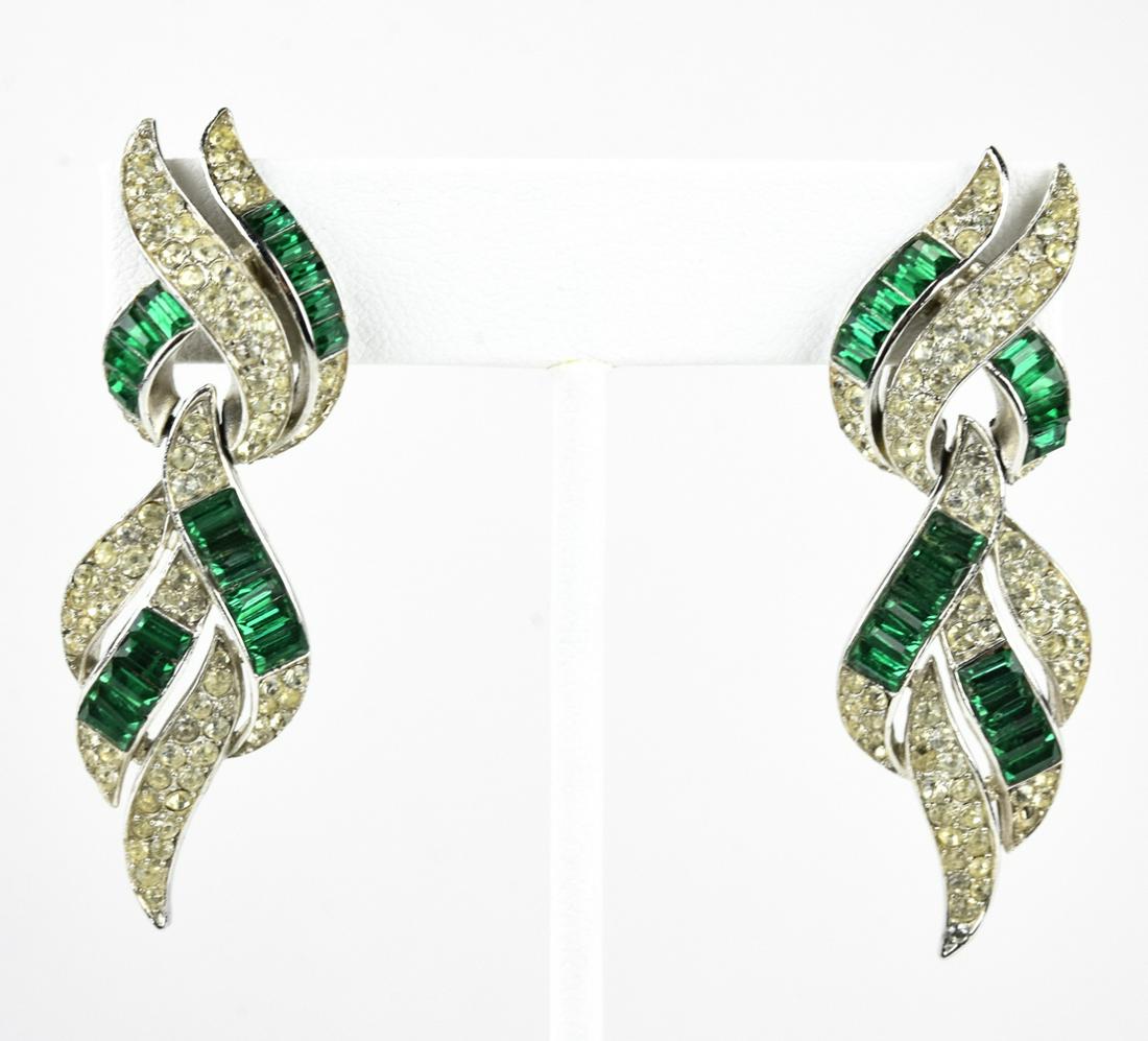 Vintage Trifari C 1960s Emerald Paste Earrings: Vintage Trifari C 1960s Emerald Paste Earrings. Clip ons with rhinestones. Each measures 2.25 inches in length.