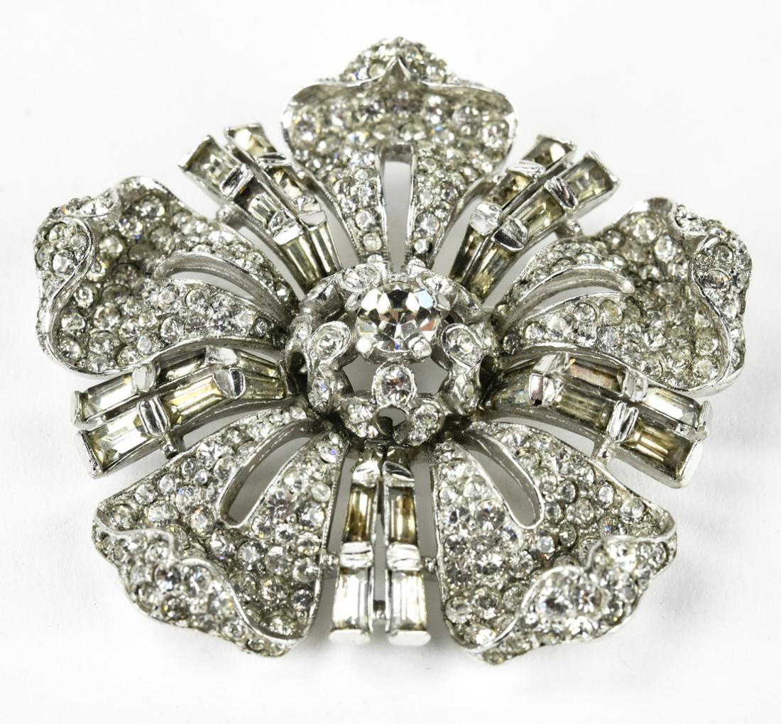 Antique C 1930s Pat Pend Trifari Floral Brooch: Antique C 1930s Pat Pend Trifari Floral Brooch. With rhinestones. Measures 2.25 inches in diameter.