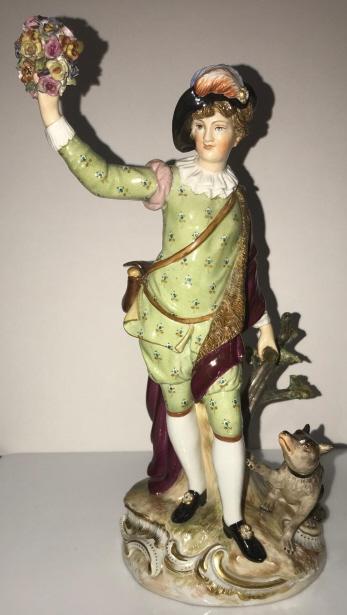 Antique Meissen Figural Boy & Shepherd Statue: Antique Meissen Figural Boy & Shepherd Statue. Antique Meissen hand painted porcelain statue depicting a boy holding a floral wreath with a shepherd dog at his feet. With crossed sword mark on bottom,