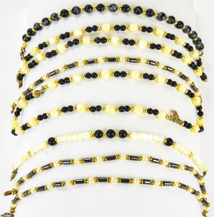 9 Onyx Mother of Pearl Hematite & 14k Bracelets: 9 Onyx Mother of Pearl Hematite & 14k Bracelets. 9 onyx, mother of pearl and hematite bead bracelets including 14kt yellow gold beads and / or clasps. 8 inches in length.