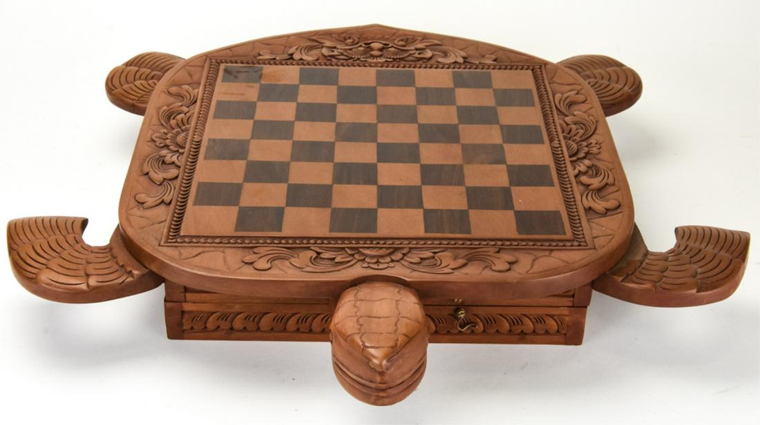 Hand Carved Chess Board in Sea Turtle Form: Craftsman Made Hand Carved Chess Board in Sea Turtle Form with Hand Carved Chess Pieces. 22 inches x 22 inches x 4 inches