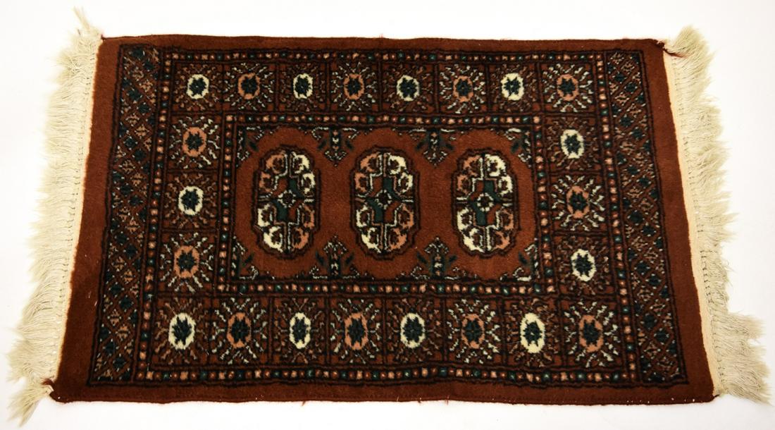 Vintage Hand Woven Wool Bokhara Prayer Carpet: Vintage Hand Woven Wool Bokhara Prayer Carpet. Rust, green and ivory color ways. 36 inches x 24 inches