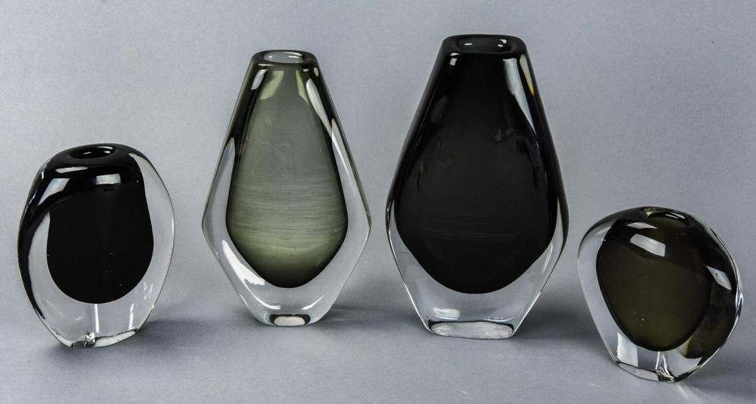 4 Orrefors Black Art Glass Vases: 4 Orrefors Black Art Glass Vases. All vases are signed. Largest is approximately 8 inches x 5 inches in diameter.