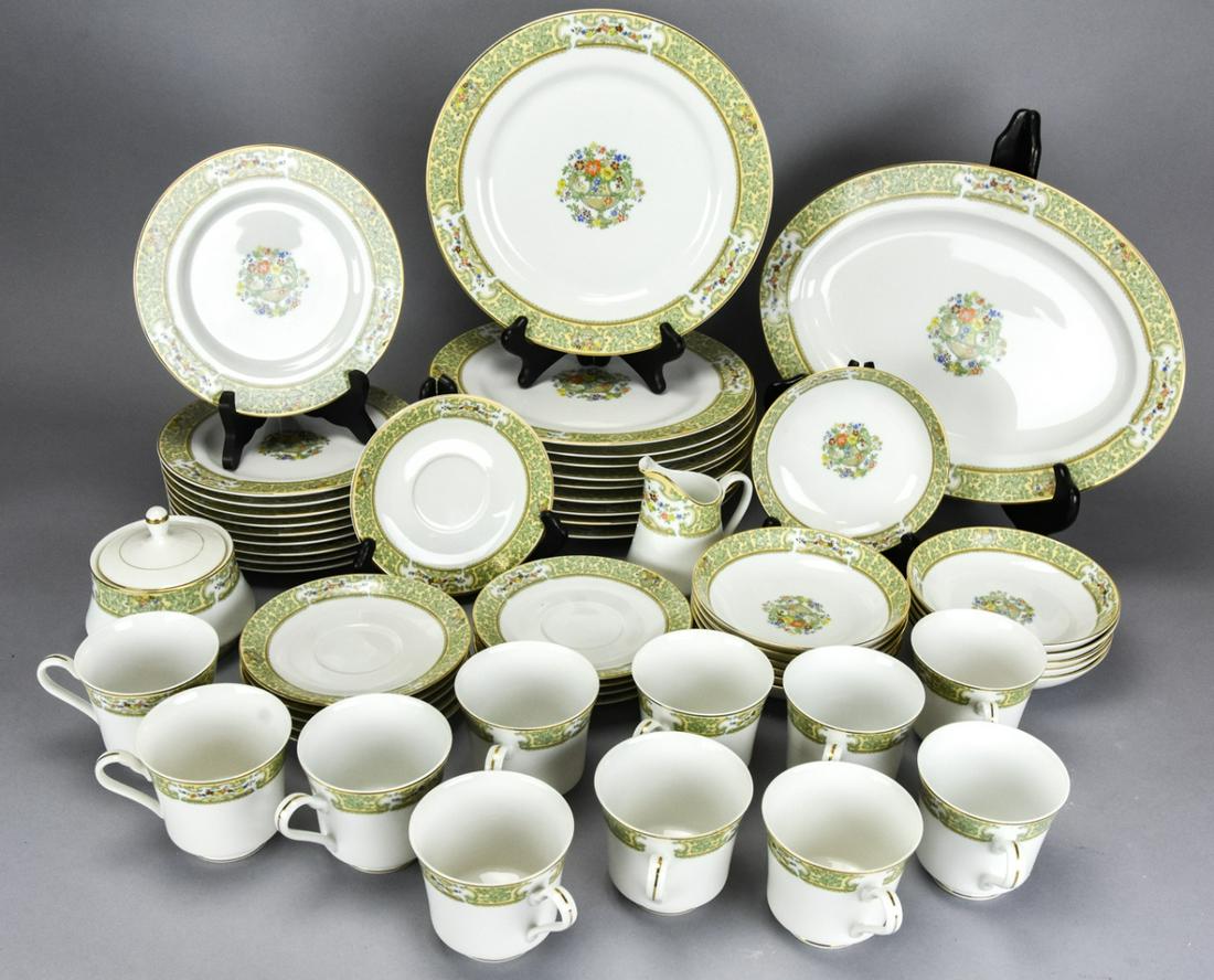 Mikasa Couture Summer Bouquet Porcelain Service 10: Mikasa Couture Summer Bouquet Porcelain Service for 10. Includes dinner plates, lunch plates, bowls, lunch plates, salad plates, coffee cups and saucers and serving pieces. Dinner plates measure 11 in