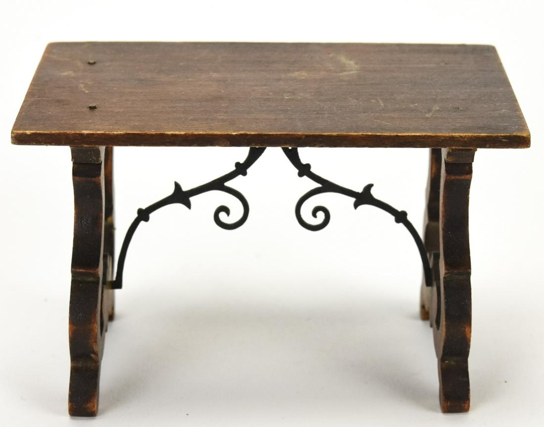 Antique Tynietoy Dollhouse Spanish Dining Table: Antique Tynietoy Dollhouse Spanish Collection Dining Table. Marked on bottom. Measures just over 4 inches in width.