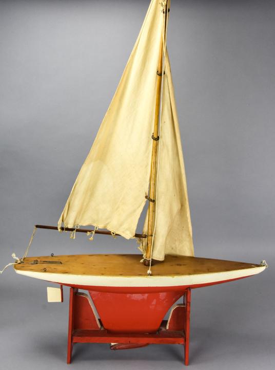 Vintage Hand Carved Painted Toy Sail Boat: Vintage Hand Carved and Hand Painted Toy Sail Boat. Originally designed to be water worthy. Boat is weighted. Hand made sails. 48 inches x 26 inches