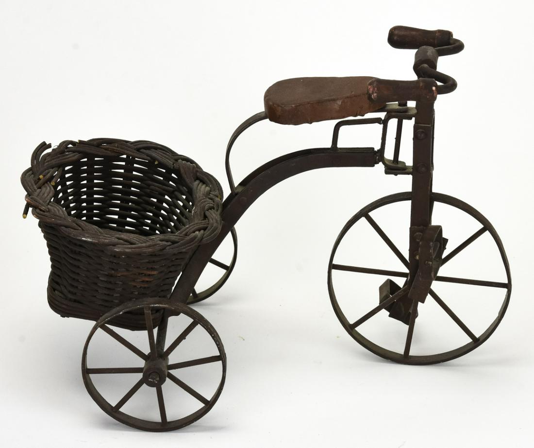 Antique Hand Wrought Iron Doll Tricycle w Basket: Antique Hand Wrought Iron Doll Tricycle w Basket. 10 inches x 11 inches x 10 inches