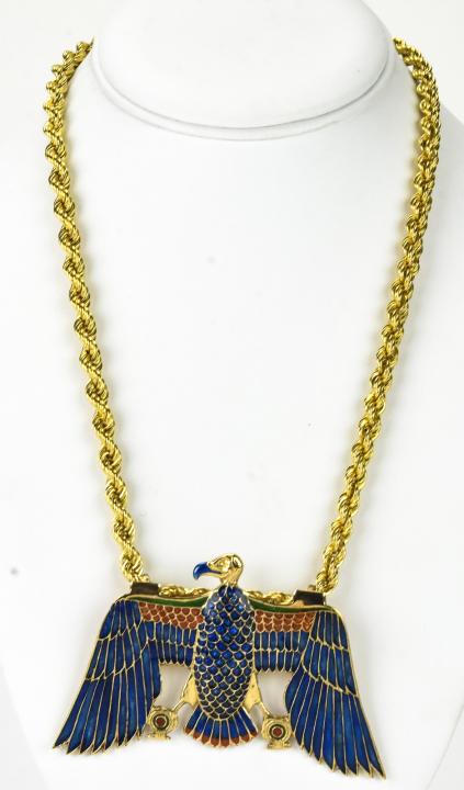 Costume Egyptian Phoenix Pendant Gold Filled Chain: Vintage Costume Egyptian Phoenix Pendant on Gold-Filled Rope Chain – Pendant is embellished with enamel and measures approximately 3.5” x 2.25” and is on a 18” chain. Comes with a matching rop