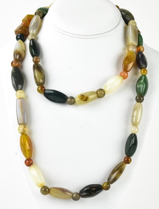 Vintage Handmade Agate & Carnelian Bead Necklace: Vintage Handmade Agate & Carnelian Bead Necklace. Measures 42 inches in length.