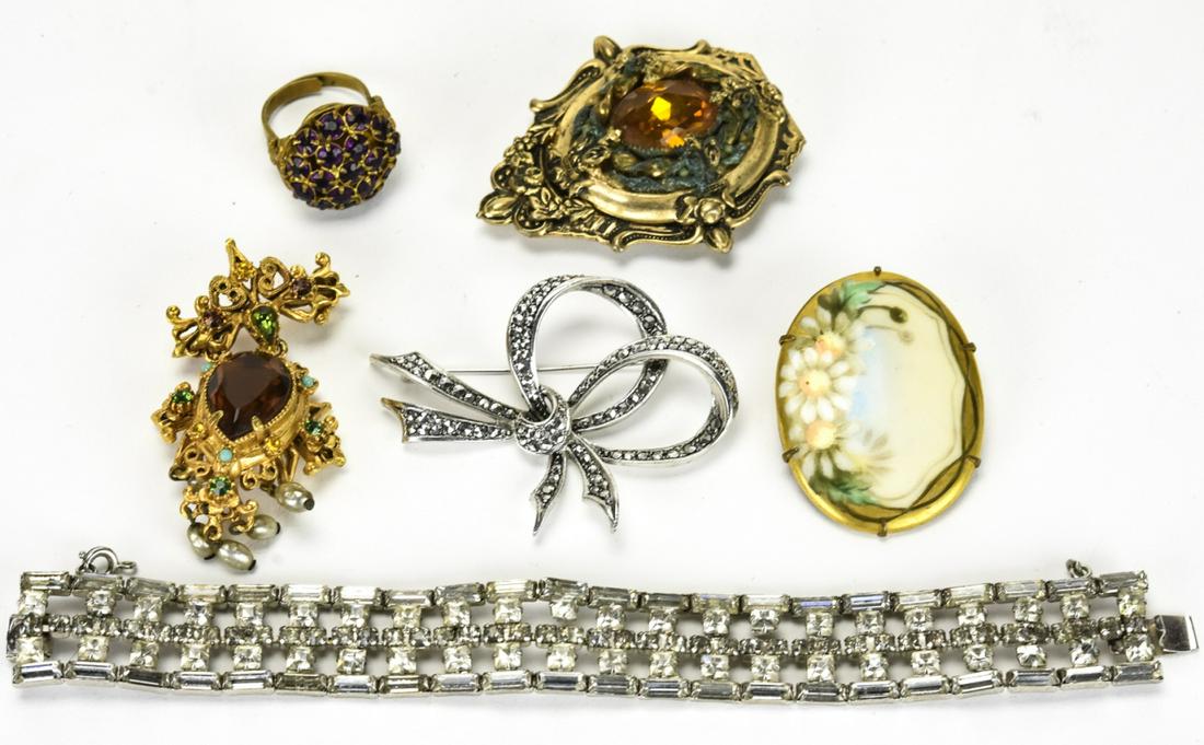Collection Antique & Vintage Costume Jewelry: Collection Antique & Vintage Costume Jewelry. Sterling and marcasite bow brooch. Brooch, clip, rhinestone bracelet, etc.